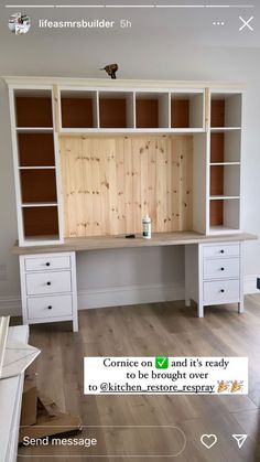 a white desk with wooden shelves and drawers