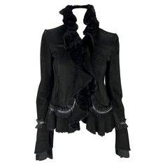 TheRealList presents: a black shearling Roberto Cavalli coat. From the Fall/Winter 2006 collection, this jacket has a black suede exterior with a shaved shearling fur lining. Featuring a ruched black ribbon and snakeskin detailing throughout, the jacket is made complete with flared cuffs and a ruffled collar/closure. Follow us on Instagram! @_the_reallist_ Approximate measurements: Size - 40IT Shoulder to hem: 23" Bust: 32 - 34" Waist: 32" Shoulder to cuff: 26.5" Underarm to cuff: 20" 100% leath Off Shoulder Jacket, Shag Jacket, Soft Goth, Dream Wishlist, Roberto Cavalli Dress, Culture Fashion, Ruffle Jacket, Versace Couture, Ruffled Collar