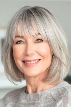 36 Gray Hairstyles For Older Women That Will Make Silver Your Signature Look - The Hairstyle Edit Silver Bob Haircut Bangs, Grey Bob Hairstyles Over 50 With Fringe, Medium Length Grey Wigs, Medium Length Grey Hair With Bangs, Short Bob Hairstyles With Bangs Over 50 Glasses Gray Hair, Mom Haircuts, Gorgeous Gray Hair, Chin Length Hair