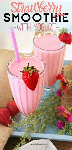 strawberry smoothie with yogurt in glasses and strawberries on the side for garnish