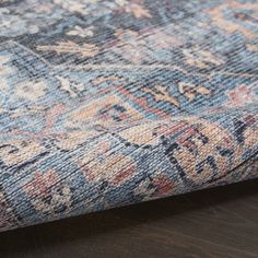 In a faithful nod to timeless Persian artistry, this boho rug from the Nicole Curtis Series 1 Washable Rug Collection features an intricately printed floral medallion design in blue, beige, and pink multicolor. A modern heirloom for your home in a wonderfully soft blend of cotton and chenille, it’s finished with intentional distressing for that true vintage feel. This lightweight, flat woven rug is machine-washable and fits easily under furniture and near doorways. Nicole Curtis, Vintage Inspired Rugs, Beige And Pink, Nourison Rugs, Flat Woven Rug, Pink Area Rug, Medallion Design, Washable Area Rugs, Nebraska Furniture Mart