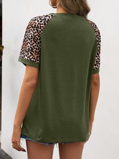 The EMES SHOP tee is detailed with a fierce two tone design with leopard prints. Features a round neck line. short sleeves. and regular fit. Pair it with denim shorts and sneakers for an easy look.MATERIAL:100%Soft Poly MEASUREMENTS:Product Length 25"-27"in Small | Bust & Hem Width : 35"-37"in Medium| Bust & Hem Width : 37"-39"in Large| Bust & Hem Width : 39"-41"in X Large| Bust & Hem Width : 41"-43"in MEASUREMENTS:Product Length 65-69 cm Small | Bust & Hem Width : 88"-93"cm Medium| Bust & Hem Width : 93"-98"cm Large| Bust & Hem Width : 98"-103"cm X Large| Bust & Hem Width : 103"-108"cm Casual Leopard Print Crew Neck T-shirt, Leopard Print Relaxed Fit Short Sleeve Tops, Leopard Print Relaxed Fit T-shirt With Crew Neck, Leopard Print Short Sleeve Top With Relaxed Fit, Leopard Print Tops With Relaxed Fit And Short Sleeve, Relaxed Fit Leopard Print Tops With Short Sleeves, Short Sleeve Leopard Print Tops For Summer, Casual Leopard Print Tops For Summer, Cotton Leopard Print T-shirt For Summer