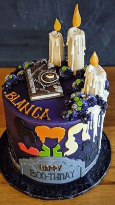 a birthday cake decorated with candles and decorations