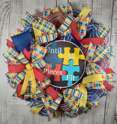 a colorful wreath that says, until all the pieces fit