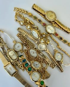 Elevate your accessory collection with these timeless vintage gold watches featuring stunning gemstone and pearl accents. Designed for those who love dainty, elegant timepieces, these watches offer the perfect blend of retro charm and modern sophistication. Ideal for stacking with other jewelry or wearing solo for a statement look, these classic wristwatches bring effortless style to any outfit. Vintage Gold Watch, Pearl Watch, Avengers Outfits, Jewelry Stack, Dope Jewelry Accessories, Funky Jewelry