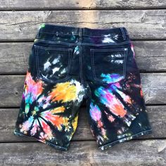 | Tie Dye Jean Shorts | 💛 A summer stable ~ These comfortable and vibrant shorts feature a skinny fit and comfortable stretch. They put a funky little spin on your usual jean shorts. When warm weather hits, just toss on a T-shirt and you're ready to groove! Features: - Cotton and spandex blend for stretch and comfort - Deep pockets to store your phone and wallet - Comfortable - Fast Shipping *Care instructions : Wash with colors or by itself ~ using cold water. Tumble dry on any heat setting. T Fitted Multicolor Shorts For Festival, Fitted Tie Dye Short Bottoms, Fitted Tie-dye Short Bottoms, Multicolor Short Bottoms For Festival, Mens Jean Shorts, Tie Dye Men, Tie Dye Jeans, Tie Dye Rainbow, Spiral Tie Dye