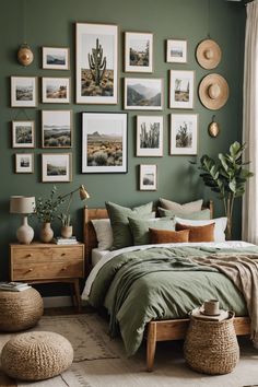 a bedroom with green walls and pictures on the wall above the bed, along with wicker stools