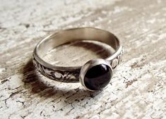 Want 20% off this item? Go here to claim your coupon code! https://pintody.com/pages/discounts This black onyx ring is made with a sterling silver floral band that is study for years and years of wear. The band has been oxidized to bring out the pattern. The genuine black onyx stone is set in a sterling silver plain bezel. This makes a perfect ring for stacking with others but makes a fabulous ring to wear alone. 🙞 FEATURES 🙜 ☙ Made in your size ☙ Crafted from solid sterling silver and black o Black Oxidized Rings For Anniversary, Adjustable Black Engraved Ring, Black Oxidized Promise Ring, Black Sterling Silver Engraved Ring, Classic Black Rings With Oxidized Finish, Adjustable Black Engraved Round Ring, Black Vintage Engraved Ring Stamped 925, Vintage Black Engraved Ring Stamped 925, Bracelet Size Chart