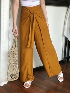 Solid High-waisted Harem Pants For Beach, Non-stretch Brown Pants For Beach, Brown Vacation Trousers, High-waisted Brown Harem Pants For Summer, Summer High-waisted Brown Harem Pants, Brown Wide-leg Beach Pants, Yellow Wide-leg Harem Pants With Elastic Waistband, Wrap Pants Outfit, Bali Pants