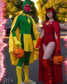 two people in costumes standing next to each other