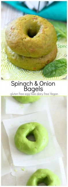 two green doughnuts sitting on top of each other with the words spinach and onion bagels above them