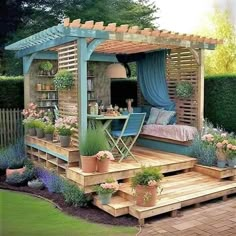 a wooden gazebo sitting on top of a lush green hillside next to a garden