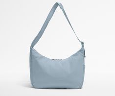 Shop the Large Featherlight Crossbody Versatile Bags With Soft Interior For Daily Use, Versatile Daily Bags With Soft Interior, Versatile Bag With Soft Interior, Versatile Everyday Bag With Soft Interior, Versatile Travel Bag With Soft Interior, Light Blue Crossbody Shoulder Bag For On-the-go, Everyday Light Blue Bag With Adjustable Strap, Light Blue Everyday Bag With Adjustable Strap, Versatile Blue Hobo Bag For Travel