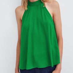 Neck Holder Blouse New In Green Chic Solid Color Spring Tank Top, Spring Sleeveless Solid Color Tops, Sleeveless Solid Color Tops For Spring, Solid Green Top For Summer, Trendy Sleeveless Solid Color Blouse, Green Solid Color Summer Top, Spring Solid Color Cami Top, Spring Sleeveless Blouse In Solid Color, Solid Color Summer Blouse For Night Out