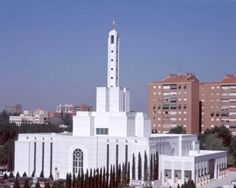 a large white building with a tall tower