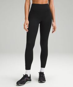 Smooth strides ahead. We removed the inner-thigh seams from these lightweight run tights to reduce friction. Three waistband pockets and two thigh pockets keep essentials close. Designed for Running. Full length intended to sit at ankle. Two side drop-in pockets fit your phone. Three drop-in pockets on the waistband to hold small items. No inseam for a smooth stride. Continuous drawcord. Reflective details. Michelle Yeoh, Tank Top Dress, Inner Thigh, High Rise Leggings, Black Friday Shopping, Bottom Clothes, Tight Leggings, Hoodie Top, Small Items