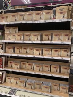 the shelves are full of boxes and other items for sale in a store or department