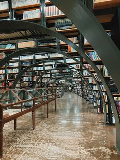 the inside of a library filled with lots of books