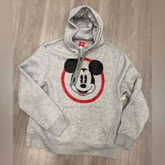 Amazon Essentials Disney Mickey Mouse Men's Pullover Hoodie Sweatshirt Gray L Mickey Mouse Sweatshirt For Winter Streetwear, Disney Cotton Hoodie With Drawstring Hood, Disney Cotton Hoodie With Drawstring, Mickey Mouse Fleece Hoodie With Long Sleeves, Mickey Mouse Long Sleeve Fleece Hoodie, Mickey Mouse Fleece Hoodie, Mickey Mouse Hoodie Top For Winter, Mickey Mouse Hoodie For Winter, Mickey Mouse Winter Hoodie Top