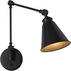 a black wall light with a white background