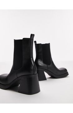 A square toe modernizes the look of a chelsea boot lofted by a chunky block heel for added durability and comfort. Synthetic upper/textile lining/synthetic sole
 Imported Modern Chelsea Boots With Stacked Heel And Square Toe, Square Toe Chelsea Boots With Reinforced Heel For Work, Modern Chelsea Boots With Stacked Heel And Round Toe, Modern Chelsea Boots With Square Toe And Reinforced Heel, Modern Chelsea Boots With Reinforced Heel And Square Toe, Trendy Chelsea Boots With Block Heel For Work, Modern Square Toe Chelsea Boots For Work, Trendy Chelsea Boots With Reinforced Heel For Work, Modern Chelsea Boots With Square Toe For Work