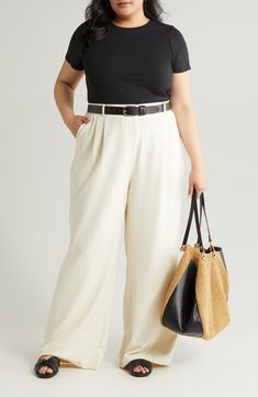 Soften your in-office look with flowy, wide-leg pants cut from a textured, seasonless blend and fronted with stitched-down pleats. 31" inseam; 30" leg opening; 14" front rise; 17" back rise (size 18) Zip fly with hook-and-bar closure Front slant pockets; back button-welt pockets 30% recycled polyester, 28% polyester, 37% viscose, 5% elastane Dry clean Imported Womens Business Professional Plus Size, Office Casual Plus Size, Plus Size Real Estate Agent Attire, Plus Size Interview Outfit Casual, Plus Size Work Dresses Professional, Trouser Outfit Plus Size, Classic Outfits Plus Size, Cream Dress Pants Outfit, Plus Business Casual Outfits