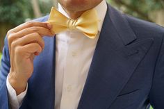 Master the art of elegance with OTAA's Light Yellow Satin Self Tie Bow Tie. Impeccably imbued with a delicate yellow palette, the simple design of this untied bow tie puts all the right emphasis on colour. A brilliant statement for weddings and important work meetings, this Light Yellow Satin Self Tie Bow Tie is as versatile as it is memorable. Let OTAA's signature hand-stitched approach give this handmade self tie bow tie an additional essence of luxury. Designed in-house and tailored b Untied Bow Tie, Yellow Palette, Yellow Bow Tie, Yellow Socks, Work Meetings, Yellow Bow, Tie Bow Tie, Homecoming Outfits, Kids Bow Ties