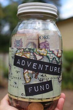 a jar filled with money sitting on top of a table