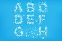 an alphabet made up of bubbles on a blue background with the words abc def glob