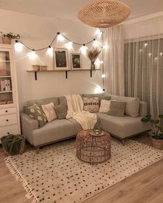 a living room filled with furniture and lights