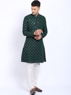 HANDMADEKURTASHOP  Description Man kurta for Man Give yourself a best ethnic look by wearing this Top and bottom Set. Made of rich cotton silk blend fabric this regular-fit set comprises a full-sleeved Indian kurta pajama This outfit with mojris will look apart on special occasions. material 100%Cotton Color : Green color  Kurta Length : 40 inches Kurta Pajama set Mirror work kurta  Shirt Chest is measurement for shirt (not body) As per standard, for best loose fitting 6 inches gap should be there between actual chest size and shirt chest size Size chart is below Men's Sizes Actual Body Chest - Ready Shirt Chest i Add 6" Inches Lose Fitting Fabric Armhole To Armhole. XS - 30" Inches 36" Inches S - 34" Inches 40" Inches M - 36" Inche 42" Inches L - 40" Inches 46" Inches XL - 44" Inches 50" Green Straight Kurta Sherwani For Puja, Green Sherwani For Puja With Straight Kurta, Festive Kurta With Dabka Work For Puja, Eid Kurta With Self Design And Straight Shape, Green Semi-stitched Kurta For Puja, Festive Dabka Work Kurta For Puja, Green Festive Kurta For Puja, Green Sherwani For Puja And Eid, Green Sherwani For Eid Puja