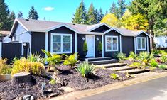 a house with landscaping in front of it