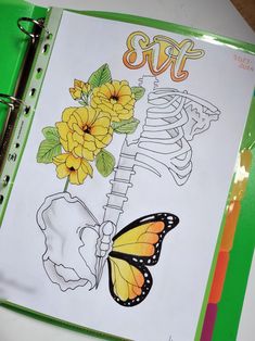 a book with an image of a butterfly and flowers on it