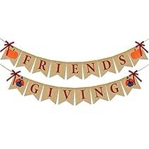 a banner that says friends giving with two pumpkins on it and an orange bow