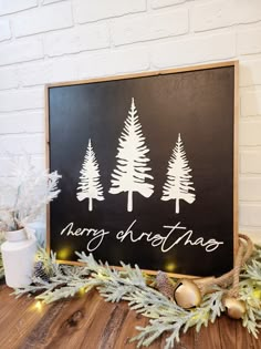 a sign that says merry and there with trees on it