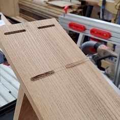 a piece of wood is being worked on