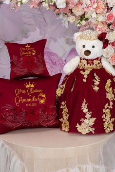 Add a touch of charm to your Quinceañera celebration with this Burgundy Pillows Set and adorable Teddy Bear featuring a Kitty design. A perfect combination of comfort and cuteness for your special day, also great as a memorable keepsake. Burgundy Quinceañera, Quinceañera pillows set, Quinceañera teddy bear, Kitty design, Quinceañera decoration, Quinceañera keepsake, Teddy bear for Quinceañera, wedding pillows, party decoration, special occasion gifts