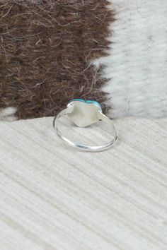 This turquoise and sterling silver inlay heart ring was made by Zuni silversmith Linda Chavez.Size: 6.25Length: 1/4"Width: 3/8"Free shipping on all orders! We ship with USPS and always include tracking. All orders ship within a day of payment.Returns are accepted up to 30 days after you receive your order. Just send us a message. Our shop offers cash back or store credit. The item must be returned in new condition. Oval Turquoise Ring With Sterling Silver Inlay, Heart-shaped Turquoise Sterling Silver Ring, Heart Shaped Silver Turquoise Ring In Sterling Silver, Gift Turquoise Inlay Ring In Sterling Silver, Gift Turquoise Ring With Sterling Silver Inlay, Anniversary Turquoise Inlay Ring In Sterling Silver, Native American Jewelry, Turquoise Sterling Silver, Free Jewelry