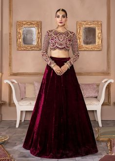 Include: Lehnga Choli Fabric: Choli: Organza Lehnga: Velvet Color: Plum Work Technique: Embellished Description: Kaawish is an absolute magical plum organza choli featuring lustrous embellishments in monochromatic hues. The scalloped choli is paired with a dreamy draped velvet lehnga, making this exquisite look a must have. This is a 2 piece stitched outfit Disclaimer: The color of the outfit may vary due to lightening effect of photography Organza Choli, Choli Style, Kanwal Malik, Velvet Blouse Design, Velvet Lehenga, Simple Lehenga, Velvet Dress Designs, Lehenga Blouse Designs