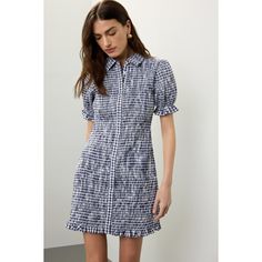 Navy Gingham (100% cotton). Casual Dress. Collared neck. Short sleeve. Front button closure. 35" from shoulder to hemline. Imported. Plaid Cotton Collared Shirt Dress, Plaid Collared Cotton Shirt Dress, Spring Preppy Short Sleeve Plaid Dress, Preppy Short Sleeve Plaid Dress For Spring, Collared Gingham Dresses, Collared Gingham Dress For Spring, Knee-length Cotton Plaid Dress For Daywear, Casual Cotton Puff Sleeve Dress For Work, Fitted Collared Gingham Dress