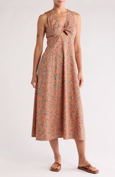 A cutout at the bodice adds a twist to a cotton-poplin midi dress made with a V-neckline, an A-line skirt and an adorable floral print for a charming finish. 51" length (size 8) Back zip closure V-neck Sleeveless Unlined 100% cotton Machine wash, tumble dry Imported Twist Front, Nordstrom Dresses, A Line Skirt, Cotton Poplin, A Line Skirts, Dress Making, Madewell, Bodice, Floral Print