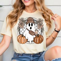 Cute Ghost Halloween Shirt, Pumpkin Spice Coffee Tee, Spooky Season Shirts Discover Our Newest Collection Of Stylish And Adaptable T-Shirts (Gildan 5000), Where Fashion Meets Comfort! Available In A Wide Range Of Sizes From S To 3xl And Lively Color Choices Including Black, White, Sand, Green, Sport Grey, Red, Navy, And More, Ensuring There's Something For Everyone. Carefully Crafted With Premium Materials, Our T-Shirts Offer A Luxurious Feel And A Snug Fit That Lasts All Day. Engineered To With Casual White Shirt For Halloween, Spice Coffee, Pumpkin Spice Coffee, Coffee Tees, Spiced Coffee, Pumpkin Shirt, Ghost Halloween, Cute Ghost, Bespoke Design