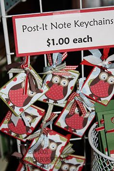 an owl themed post - it note keychains are on display for $ 100 each