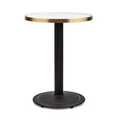 a round table with a black base and gold trimmings on the top, against a white background