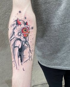 a person with a tattoo on their arm