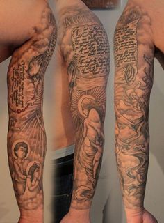 two men with tattoos on their arms, one has an image of jesus and the other is