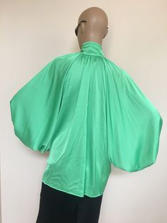 "This is a very stylish Womens Silk blouse. It is comfortable and cozy. Made for a free flowing fit. Great for all year around and for any special occasion or casual day can be dressed up or dressed down. SIZE CHART SIZE S - US 6, UK 8, EU 36 bust: bust around 34.5\"/90cm Waist: waist around 27.5\"/70cm Hips: hips around 34.5\"/90cm SIZE M - US 8, UK 10, EU 38 bust: bust around 37.5\"/95cm Waist: waist around 29.5\"/75cm Hips: hips around 37.5\"/95cm SIZE L - US 10, UK 12, EU 40 bust: bust aroun Green Silk V-neck Top, Green Satin Summer Tops, Green Satin Tops For Summer, Green Satin Top For Summer, Spring Silk Stretch Top, Silk V-neck Top With Blouson Sleeves, Elegant Batwing Sleeve Party Tops, Green Stretch Blouse For Night Out, Stretch Green Blouse For Night Out