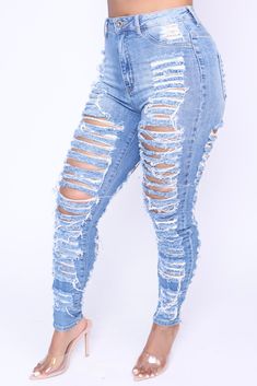 Introducing Hurricane Jeans - the perfect combination of timeless style and modern edge! Our high waisted, distressed denim jeans flatter any figure while the shredded design adds a trend-setting twist. The lack of front pockets ensures minimal bulk, while the true-to-size fit and minimal stretch keep you looking and feeling your best! - High waisted denim - Back pockets functional - True to size - Stretch - Inseam 33" Jumpsuit Jacket, Leggings Sale, Distressed Denim Jeans, Maxi Gowns, Bustier Top, Crop Top Blouse, Plus Size Jeans, Jean Leggings, Faux Fur Coat