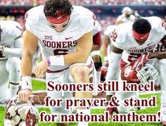 a football player kneeling down on the field with other players in the background and text that reads, somers still knee for prayer