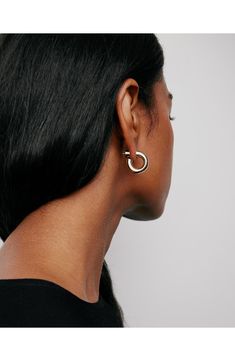 Small in scale but bold in effect, these microscopic huggies boasting an ultrawide silhouette and polished finish put the perfect finishing touch on any outfit. 6mm drop; 5mm width Post back Silvertone plate or goldtone plate Imported Modern Tarnish-resistant Hoop Huggie Earrings, Modern Shiny Huggie Earrings, Modern Tarnish-resistant Huggie Hoop Earrings, Minimalist Shiny Huggie Earrings For Formal Occasions, Modern Tarnish Resistant Huggie Hoop Earrings, Modern Everyday Luxury Huggie Earrings, Formal Minimalist Huggie Earrings With Shiny Finish, Modern Polished Hoop Earrings For Everyday, Modern Shiny Huggie Jewelry